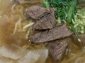 super delicious japanese and korean fusion beef ramen, Bowl of mouth watering Japanese ramen for single serving Royalty Free Stock Photo