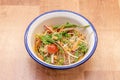 Super delicious Thai salad of rice noodles, red onion, spinach, green bean pods