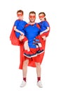 super father carrying happy kids in masks and cloaks