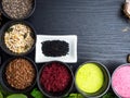 Super food health food selection in bowls, spirulina, berry powder, black cumin, pumpkin and sunflower seeds, sesame, flex seeds, Royalty Free Stock Photo