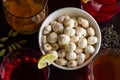 Flat lay of crunchy Fox Nuts or Makhana or Makhane and fruit punch of Kokam,Kahwa on black background.Super food,India Royalty Free Stock Photo