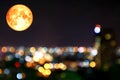 super full blood moon colorful of blur night light over city Royalty Free Stock Photo