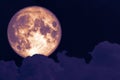 super full moon back on silhouette heap cloud on sunset sky Royalty Free Stock Photo