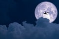 super full moon back on silhouette plane cloud on sunset sky