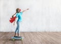 Super girl skating on a skateboard