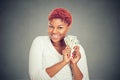 Super happy excited successful woman holding money dollar bills in hand Royalty Free Stock Photo