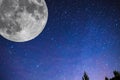 Super harvest moon. Super full moon with dark background. Europe. Horizontal Photography. Royalty Free Stock Photo