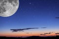 Super harvest moon. Super full moon with dark background. Europe. Horizontal Photography. Royalty Free Stock Photo