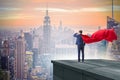 The super hero businessman on top of building ready for challenge Royalty Free Stock Photo