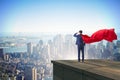 The super hero businessman on top of building ready for challenge Royalty Free Stock Photo