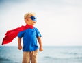 Super Hero flying in he sea Royalty Free Stock Photo