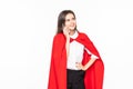 Super hero woman wearing red cape happy talking using a smartphone mobile phone isolated white background Royalty Free Stock Photo