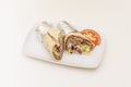 Super Lebanese Durum stuffed with lamb meat stewed with lettuce, purple