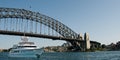 Super luxury 45mtr motor yacht passing under Sydney Harbour Bridge, Sydney Harbour, Australia Royalty Free Stock Photo