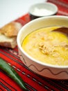 Super macro abstract feather backgroundtraditional romanian dish tripe soup known as ciorba de burta served with cream and pepper