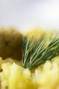 Super macro dill on traditional swim, rice with meat, carrots and onions on a white background