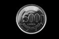 Lebanese 500 livres coin isolated on black