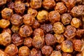 Super macro shot of dried red kampot pepper from Cambodia in detail very close. food background