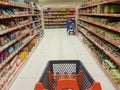 Super market inside carring god products on trolley