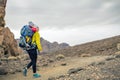 Super mom with baby boy hiking in backpack Royalty Free Stock Photo