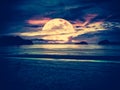 Super moon. Colorful sky with bright full moon over seascape Royalty Free Stock Photo