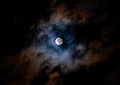 Super moon on a dark, cloudy sky on March, 9th 2020 Royalty Free Stock Photo