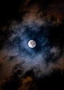 Super moon on a dark, cloudy sky on March, 9th 2020 Royalty Free Stock Photo