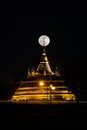 Super moon in night sky and silhouette of ancient pagoda is name Royalty Free Stock Photo