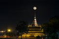 Super moon in night sky and silhouette of ancient pagoda is name