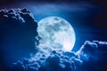 Super moon. Nighttime sky with clouds and bright full moon with Royalty Free Stock Photo