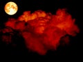 super moon and red cloud over dark tree Royalty Free Stock Photo