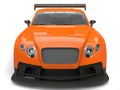 Super orange modern race super car - front view closeup shot