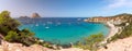 Super panorama of beautiful beach Cala Hort and the mountain Es Vedra. Ibiza, Balearic Islands, Spain Royalty Free Stock Photo