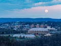 Super pink moon rises above the WVU coliseum on Evansdale campus