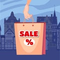 Super sale, woman s hand holding a bag, discounts. Shopping for a sale, background night city. Vector illustration Royalty Free Stock Photo