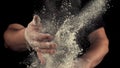 Super slow motion man cleans his hands of flour. Filmed on a high-speed camera at 1000 fps.