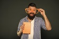 Super smart. University male student with lecture notes. Book nerd wearing fancy glasses. Bearded man in party glasses Royalty Free Stock Photo