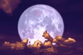 super strawberry moon back on silhouette heap cloud on sunset sky Royalty Free Stock Photo