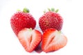 Super sweet strawberry;s with green tops with two showing off Royalty Free Stock Photo