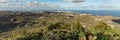 Super wide panorama. Aerial view from Bandama mountain peak. Las Palmas - capital of Gran Canaria. Warm sunny day, bright blue sky Royalty Free Stock Photo