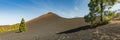 Super wide panoramic view of Volcano Arenas Negras and lava fields around. Bright blue sky and white clouds. Teide National Park Royalty Free Stock Photo