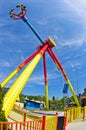Super wide view of a colorful swings in Prater amusement park at Vienna