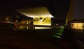 Superb night view of the Oscar Niemeyer Museum ONM one of the best examples of postmodern architecture. Curitiba, Brazil