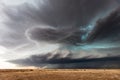 Supercell storm clouds over a field Royalty Free Stock Photo