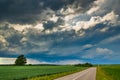 Supercell storm clouds with wall cloud and intense rain Royalty Free Stock Photo