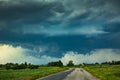 Supercell storm clouds with wall cloud and intense rain Royalty Free Stock Photo