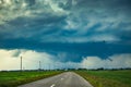 Supercell storm clouds with wall cloud and intense rain Royalty Free Stock Photo
