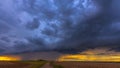 Supercell storm clouds with wall cloud and intense rain Royalty Free Stock Photo