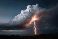 Supercell strikes with lightning at night over land Royalty Free Stock Photo