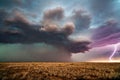 Supercell thunderstorm with dark storm clouds and lightning Royalty Free Stock Photo